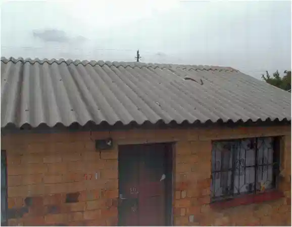 Roof Coverings for Pitched Roofs, roof coverings, pitched roofs, thatch covering, wood shingles, tiles , asbestos cement sheets, galvanized corrugated iron sheets, lightweight roofing,